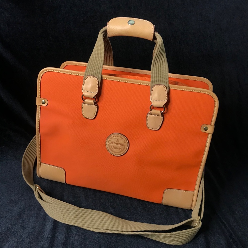 Lancel Paris Orange Canvas w/ genuine leather trim
